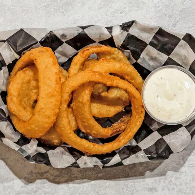 Crispy Onion Rings Basket with Ranch.